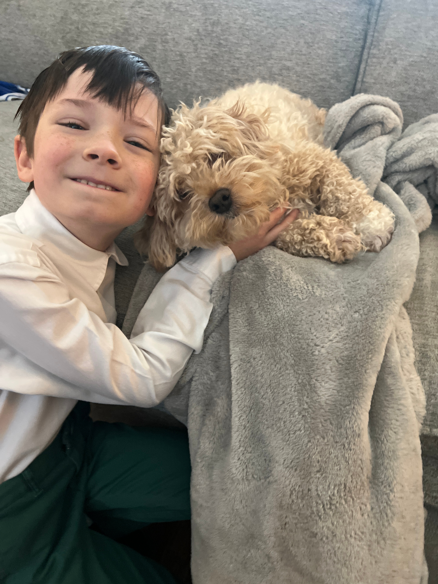 Nathan with his dog at home